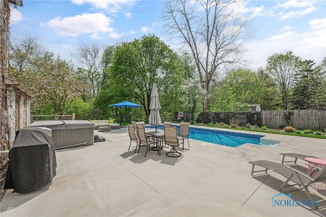 view of pool with a fenced backyard, a fenced in pool, and a patio area