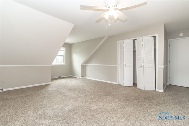 2214 Thornridge Dr, Toledo, OH 43614 - additional living space with carpet flooring, a ceiling fan, baseboards, and vaulted ceiling