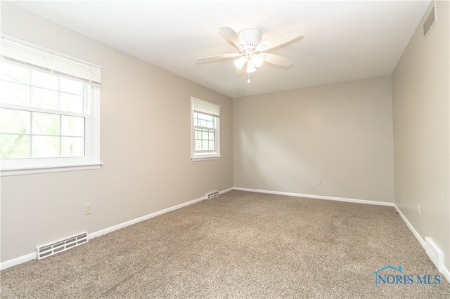 2214 Thornridge Dr, Toledo, OH 43614 - empty room featuring carpet flooring, ceiling fan, and baseboards
