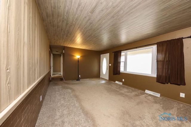 536 Edinborough Dr, Findlay, OH 45840 - spare room featuring wood ceiling and carpet floors