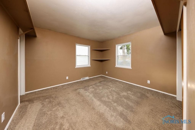 536 Edinborough Dr, Findlay, OH 45840 - carpeted empty room with baseboards