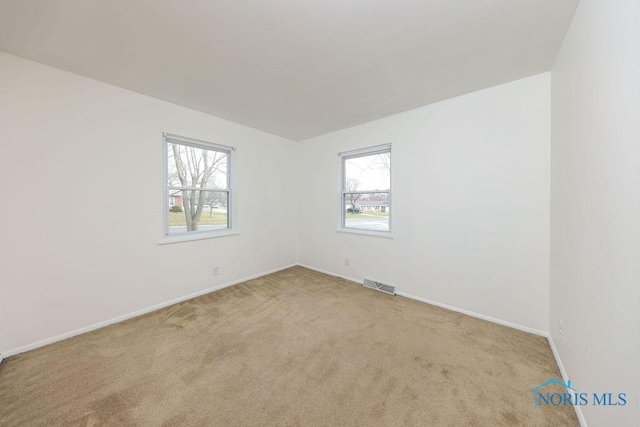 536 Edinborough Dr, Findlay, OH 45840 - carpeted spare room with baseboards