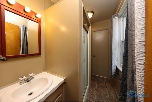 536 Edinborough Dr, Findlay, OH 45840 - bathroom with vanity, a shower with shower door, and stone finish floors