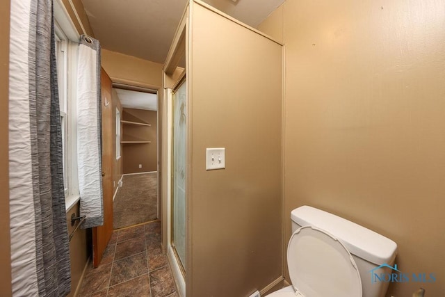 536 Edinborough Dr, Findlay, OH 45840 - bathroom featuring stone finish floors and toilet