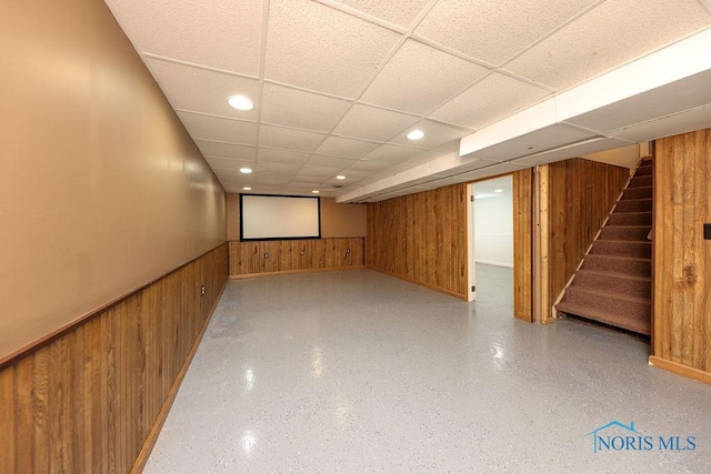 536 Edinborough Dr, Findlay, OH 45840 - finished basement featuring wooden walls, a drop ceiling, stairs, a wainscoted wall, and recessed lighting