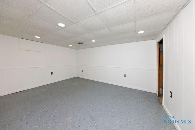 536 Edinborough Dr, Findlay, OH 45840 - unfurnished room featuring a drop ceiling, recessed lighting, baseboards, and speckle patterned floor