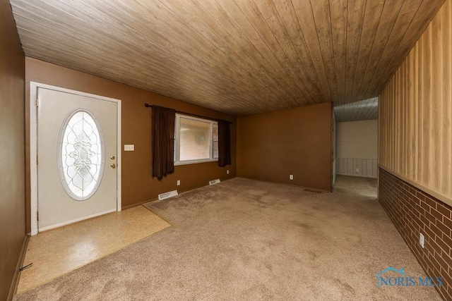 536 Edinborough Dr, Findlay, OH 45840 - foyer entrance featuring healthy amount of natural light, wood ceiling, and carpet floors