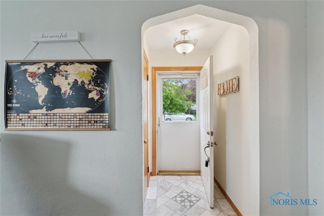 5583 304th St, Toledo, OH 43611 - doorway to outside with baseboards