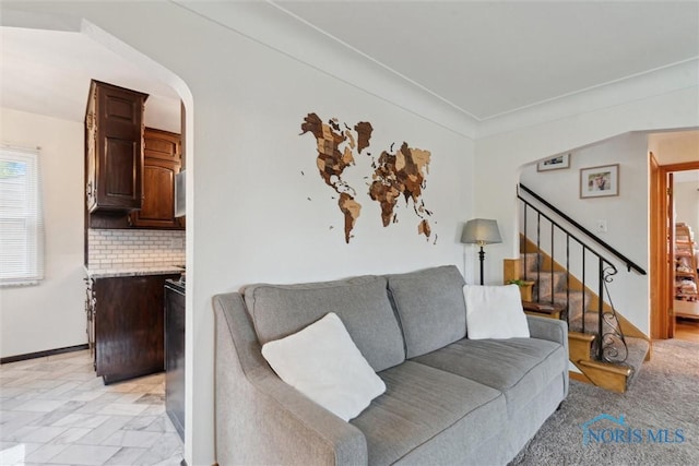 5583 304th St, Toledo, OH 43611 - living room featuring stairway and arched walkways