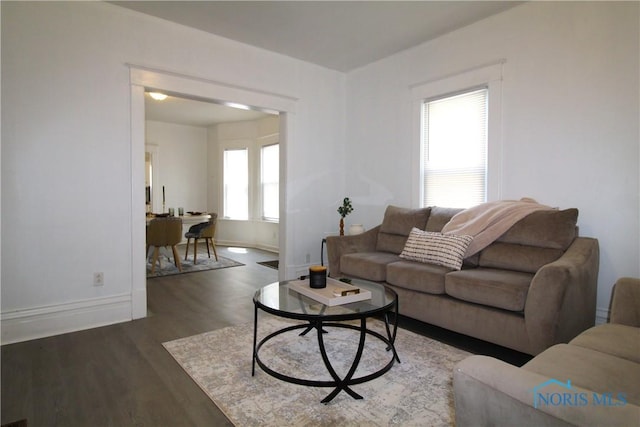 304 Dexter St, Toledo, OH 43608 - living room featuring baseboards and wood finished floors