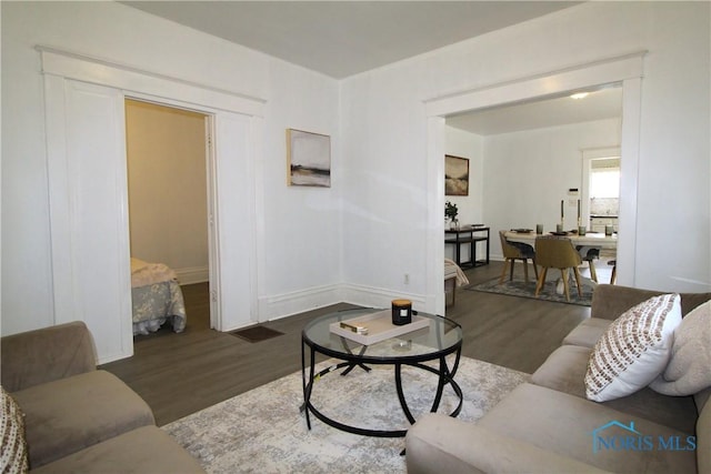 304 Dexter St, Toledo, OH 43608 - living room with baseboards and wood finished floors