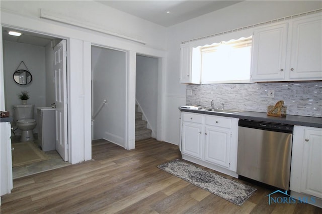 304 Dexter St, Toledo, OH 43608 - kitchen with dark countertops, dishwasher, dark wood-style floors, and a sink