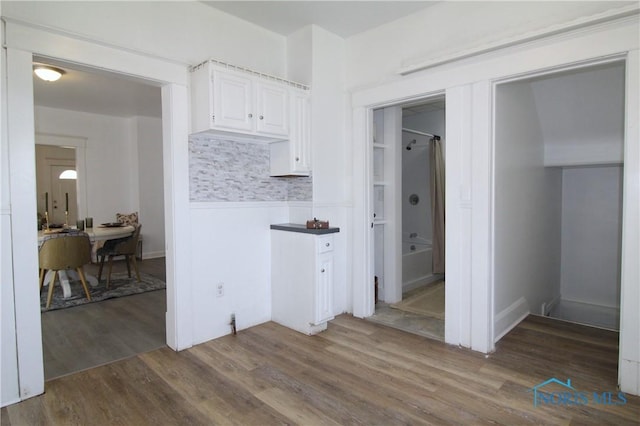 304 Dexter St, Toledo, OH 43608 - kitchen featuring white cabinetry and wood finished floors