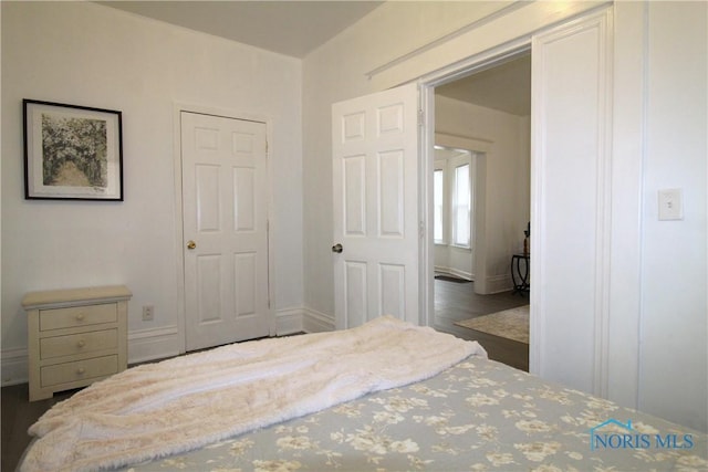 304 Dexter St, Toledo, OH 43608 - bedroom featuring wood finished floors and baseboards