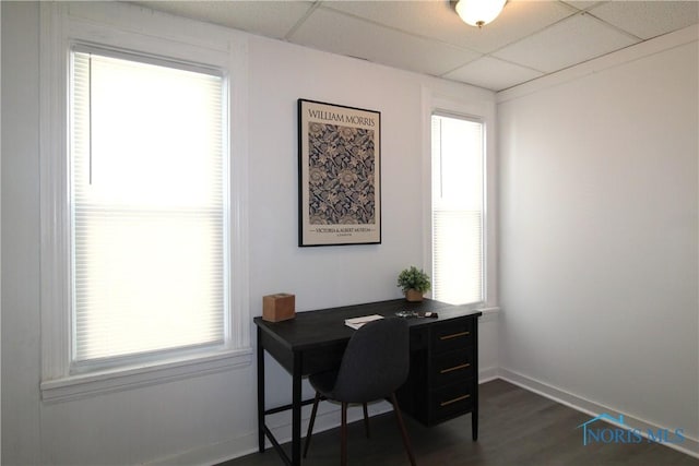304 Dexter St, Toledo, OH 43608 - office space featuring a paneled ceiling, baseboards, and dark wood-type flooring