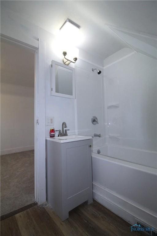 304 Dexter St, Toledo, OH 43608 - full bath featuring shower / tub combination, wood finished floors, and vanity