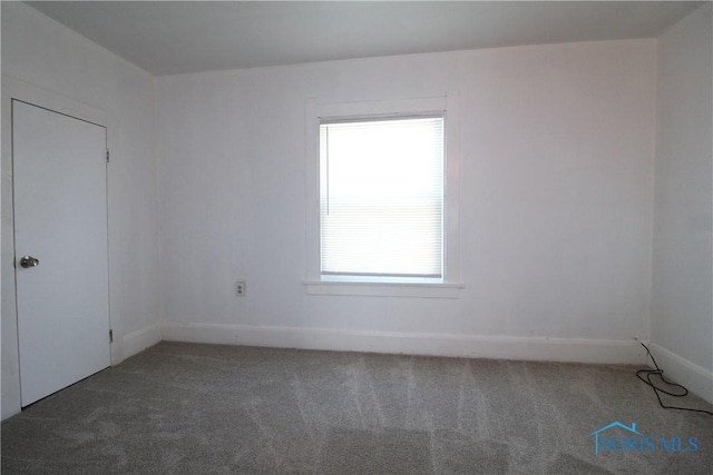 304 Dexter St, Toledo, OH 43608 - spare room with baseboards and carpet