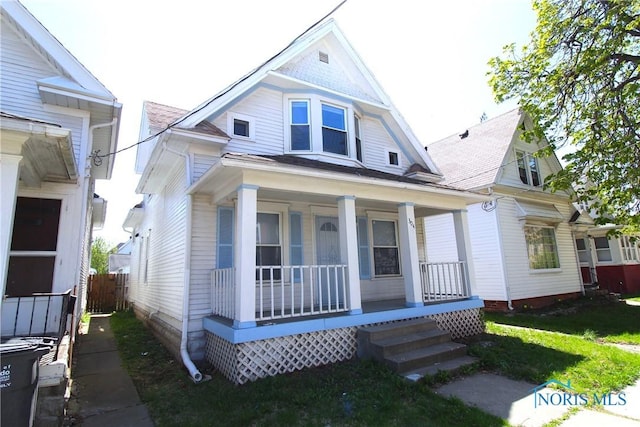 304 Dexter St, Toledo, OH 43608 - view of front facade featuring a porch