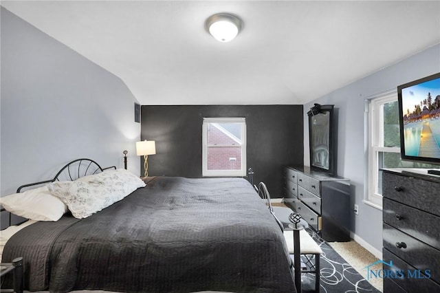 2923 Powhattan Pkwy, Toledo, OH 43606 - carpeted bedroom with lofted ceiling and baseboards