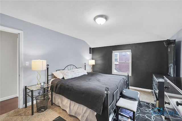 2923 Powhattan Pkwy, Toledo, OH 43606 - bedroom featuring vaulted ceiling, baseboards, and carpet flooring