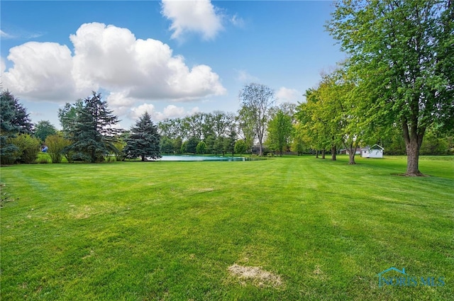 3145 Shoreland Ave, Toledo, OH 43611 - view of green lawn featuring a water view