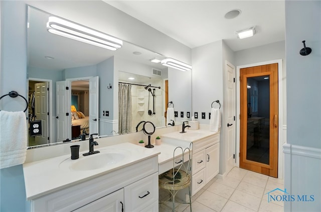 3145 Shoreland Ave, Toledo, OH 43611 - full bathroom with double vanity and a shower with shower curtain