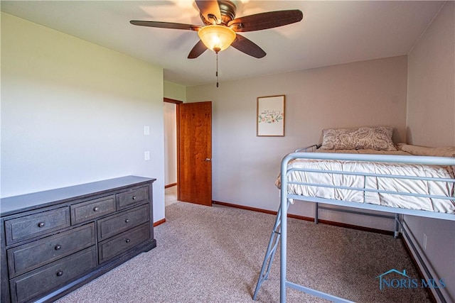 556 S Lathrop Rd, Swanton, OH 43558 - bedroom with ceiling fan, carpet flooring, and baseboards
