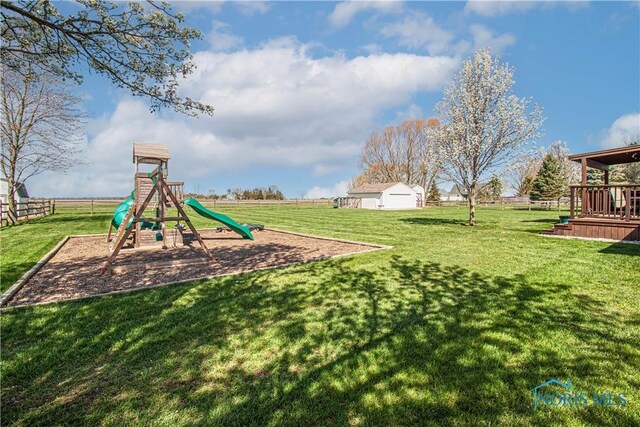556 S Lathrop Rd, Swanton, OH 43558 - view of yard with fence and playground community