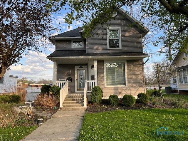 825 S Clinton St, Defiance, OH 43512 - view of front of house featuring a porch and cooling unit