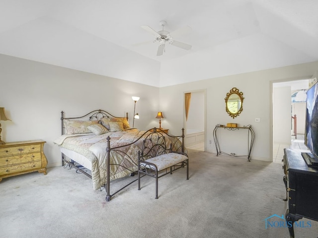 carpeted bedroom featuring a ceiling fan, lofted ceiling, and baseboards