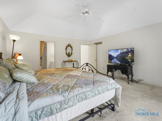bedroom with visible vents, ceiling fan, carpet, and a tray ceiling