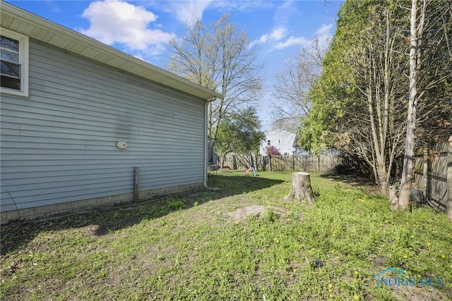 view of yard with fence