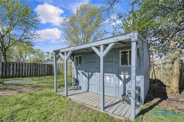 view of shed featuring a fenced backyard