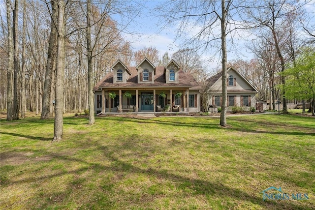 6170 S Winding Way, Swanton, OH 43558 - cape cod home with a porch and a front lawn