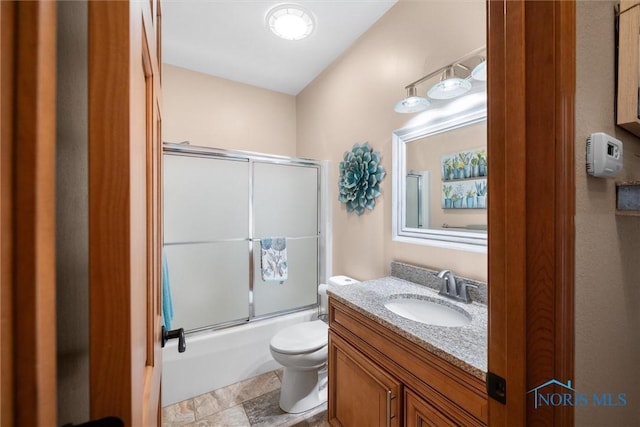 6170 S Winding Way, Swanton, OH 43558 - bathroom with combined bath / shower with glass door, toilet, and vanity
