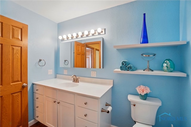 864 Cherry Ln, Waterville, OH 43566 - bathroom featuring toilet and vanity