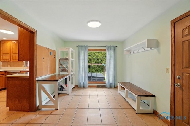864 Cherry Ln, Waterville, OH 43566 - mudroom with light tile patterned flooring and baseboards