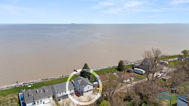 birds eye view of property featuring a residential view and a water view