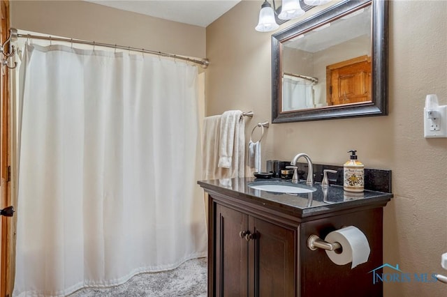 full bathroom with vanity