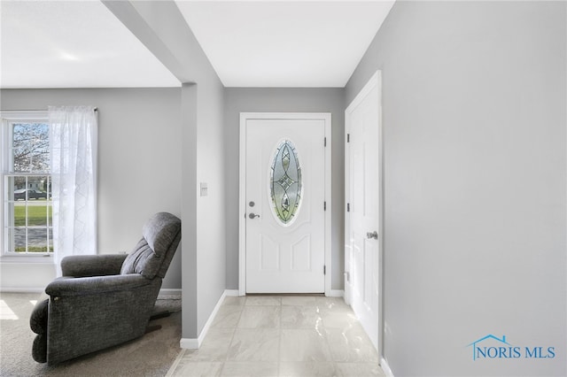 14384 Georgetown Dr, Bowling Green, OH 43402 - foyer with baseboards, a wealth of natural light, and marble finish floor