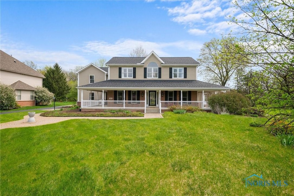 3305 Strayer Rd, Maumee, OH 43537 - farmhouse inspired home with covered porch and a front yard