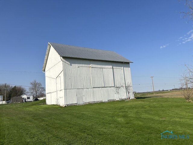 view of outbuilding with an outdoor structure