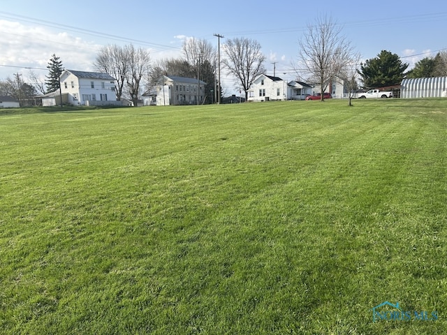 view of yard with a residential view