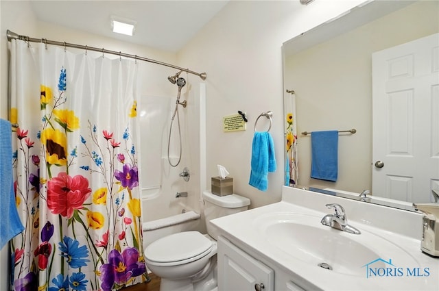 bathroom with shower / tub combo with curtain, toilet, and vanity