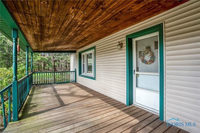 wooden terrace with covered porch