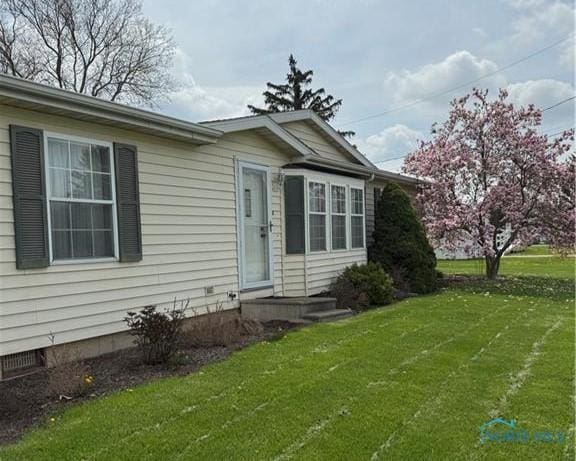 429 W Main St, Delta, OH 43515 - exterior space with a front lawn