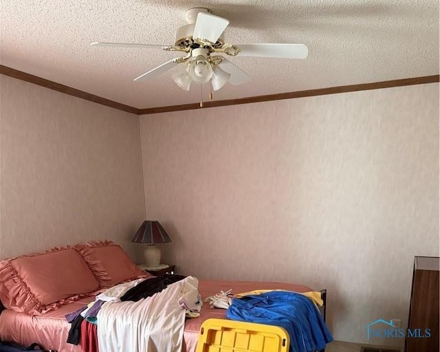 429 W Main St, Delta, OH 43515 - bedroom featuring ornamental molding, ceiling fan, and a textured ceiling