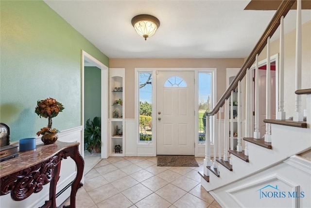 124 Miller Ave, Archbold, OH 43502 - entrance foyer featuring stairs and light tile patterned flooring
