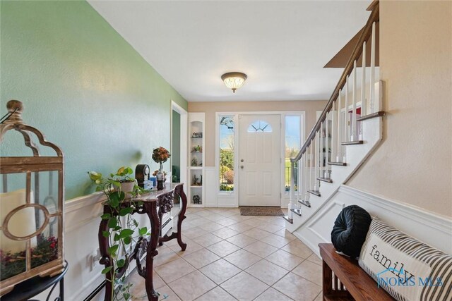 124 Miller Ave, Archbold, OH 43502 - foyer featuring light tile patterned flooring and stairway