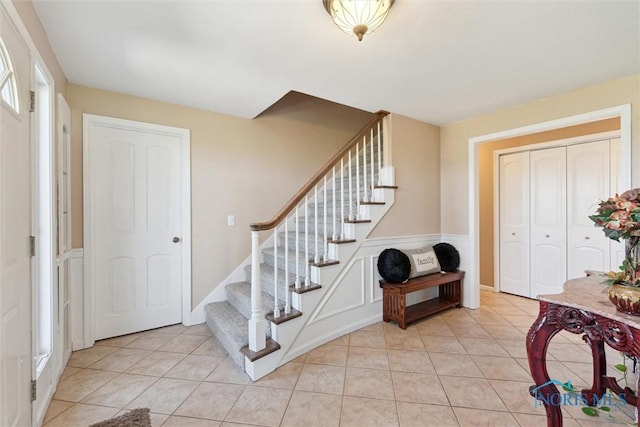 124 Miller Ave, Archbold, OH 43502 - foyer with stairs and light tile patterned floors